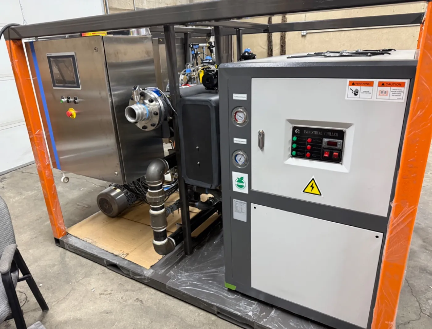 Fabricated process skid with control panel — automated epoxy mixing built by Automode